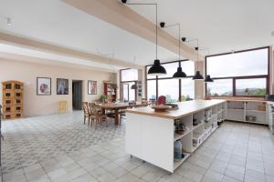 a kitchen and dining room with a large open floor plan at Casa del Cielo in Adeje