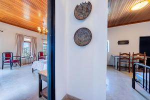 a view of a living room and dining room at Old manor house in Syvota