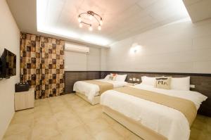Postel nebo postele na pokoji v ubytování Successful 168 B&B