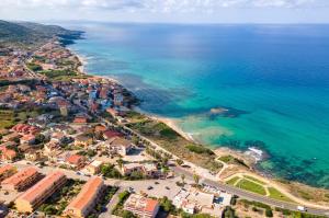 an aerial view of a beach and the ocean at Soleluna apartment in Castelsardo