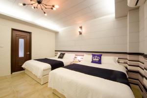 Postel nebo postele na pokoji v ubytování Successful 168 B&B