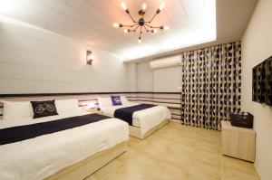 Postel nebo postele na pokoji v ubytování Successful 168 B&B