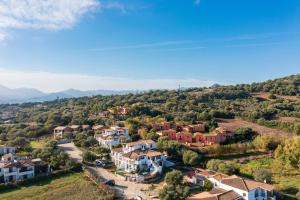 an aerial view of a small village with houses at Pasquale Home Holiday in Bari Sardo