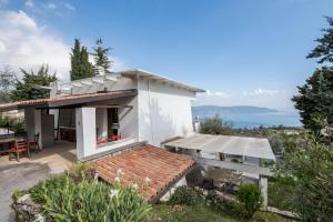 a house with a view of the ocean at Villa Bianca in Toscolano Maderno