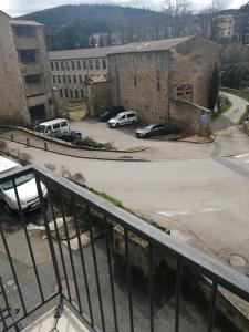 a view of a parking lot with cars parked at La Clef in Saint-Julien-Molin-Molette +14 photos