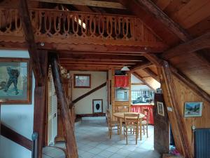 a kitchen and dining room with a table and chairs at Landrosace in Le Monêtier-les-Bains