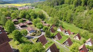 an aerial view of a village in the mountains at Ferienhaus Waldperle in Ronshausen