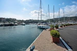 a boat is docked in a marina with boats at Casa Gocce Di Cristallo in Varazze