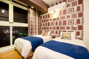 Postel nebo postele na pokoji v ubytování Successful 168 B&B