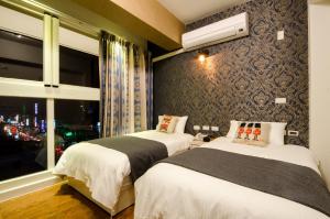 Postel nebo postele na pokoji v ubytování Successful 168 B&B