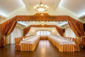 Postel nebo postele na pokoji v ubytování Hutor Hotel