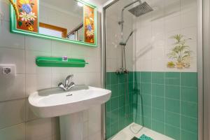 a bathroom with a sink and a shower at Cas Cover in Santa Margalida +23 photos