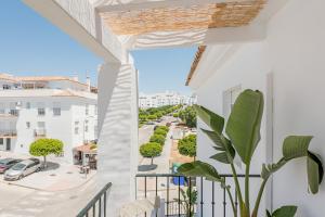 a balcony with a view of a street at House Sun Beach 2 in Vejer de la Frontera