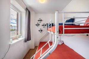 Tempat tidur dalam kamar di Tiny Home