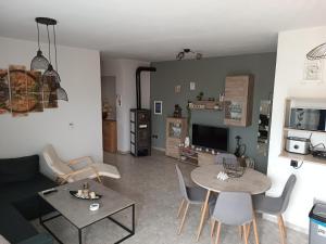 a living room with a couch and a table at Thea Home Rhodes Pastida in Pastida