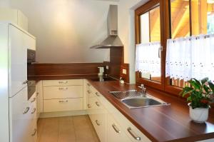 a kitchen with a sink and a window at Zipperhof in Lahr +32 photos