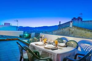 a table on the roof of a building at Maca Sol in Campanet