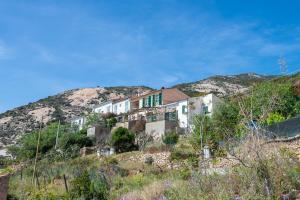 a house on the side of a hill at Casa Ebaté in Chiessi