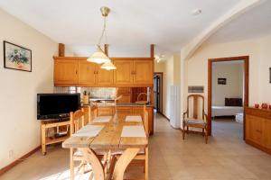 a kitchen with a table and a dining room at Moijama 4 in Los Llanos de Aridane
