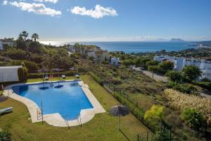 an image of a swimming pool at a resort at Casa Maria Luisa in Manilva
