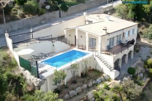 an aerial view of a house with a swimming pool at Villa Granvista by Easy Brava in Calonge