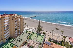 a view of a beach with buildings and the ocean at Atico Carabela By Ist in Torrox