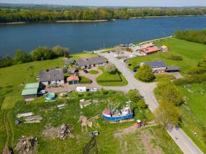an aerial view of a small village with a lake at Ferienwohnung Barsch in Rade
