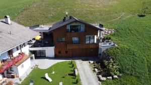 an aerial view of a house at Ladinser Hof Western Suite in Castelrotto +16 photos