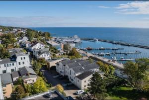 an aerial view of a town with a harbor at Ferienwohnung oberhalb vom Hafen 2 in Sassnitz