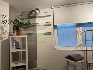 a room with a window and a white shelf at Sauerland Apartments Willingen in Willingen +52 photos
