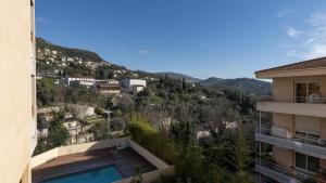 a view from the balcony of a building at Virginia N 203 ST2 in Grasse