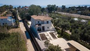 an overhead view of a white house with a street at Blue Pine Villa in Marathon
