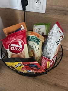 a basket filled with different types of food at Central Comfort Studio Walkup in Slezská Ostrava