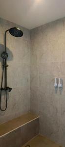a bathroom with a shower with a shower head at Yaya BCB in Gili Meno +33 photos
