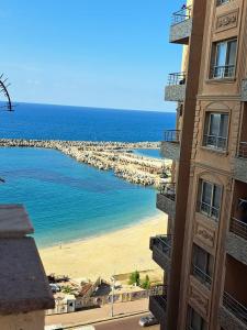 a view of a beach from a building at SARAYA AWAD HEGAZI STREET- families only in Alexandria