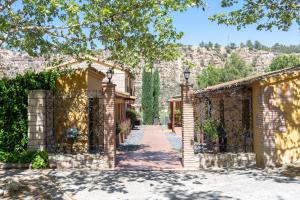 an entrance to a house with an iron gate at Mas de Sisco in Flix
