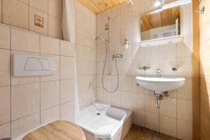 a bathroom with a shower and a sink and a toilet at L'Auberge de L'Ours in Vers L'Eglise +48 photos
