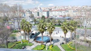 an aerial view of a park with palm trees at Central Park Hotel İstanbul in Istanbul