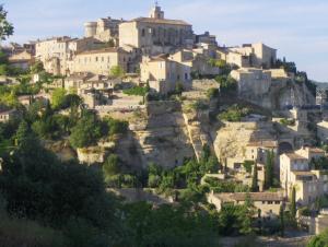 a village on a hill with houses at Gite l'Embellido in Mouriès