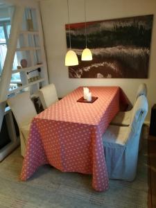 a table with a candle on top of it at Ludwig im Künstlerhaus in Langmühle +16 photos