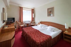 Giường trong phòng chung tại Hotel Bartan Gdansk Seaside