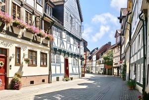 an empty street in a town with buildings at Wohnung In Wolfenbüttel in Wolfenbüttel