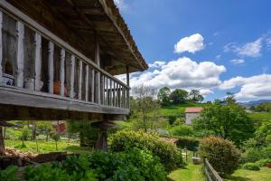 a view from the porch of an old building at El Ferre in Nava
