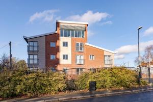 an apartment building on the side of a street at Penthouse Split Level 5 min walk to City Centre in Coventry
