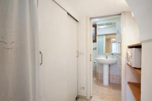 a bathroom with a sink and a mirror at U Graie in Apricale +15 photos
