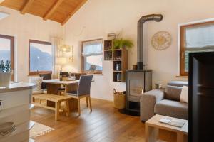 a living room with a couch and a table at Löchlerhof in Ritten