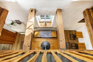 a large room with wooden walls and ceilings at Fachwerk-Ferienhaus 1764 in Eslohe +33 photos