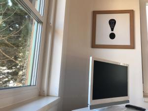 Televiisor ja/või meelelahutuskeskus majutusasutuses Ferienwohnung Mountaintop