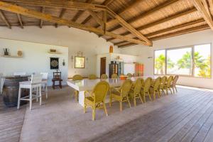 a large living room with a table and chairs at Son Perot in Maria de la Salut