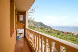 a balcony with a view of the ocean at Tmg Casa La Chocita in Los Realejos